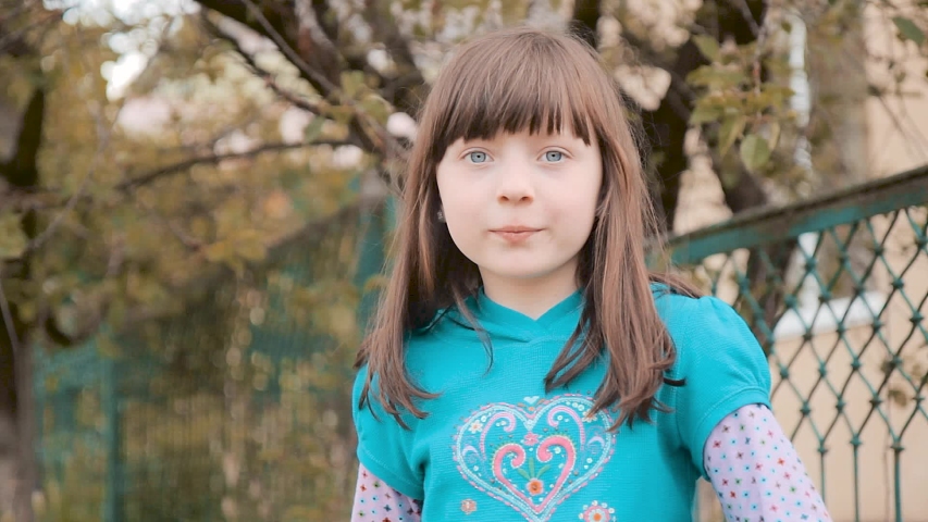 Joyfully surprised girl in the park