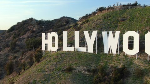 Los Angeles, California, USA - June 1, 2019 - Hollywood Sign Sunset Aerial View Zoom Out