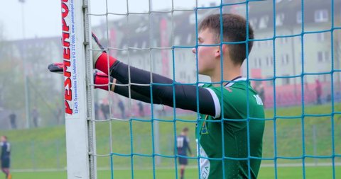 Szczecin, Poland - 12 09 2018: Young Football (Soccer) Goal Keeper Shouting Instruction To Players From His Near Post.