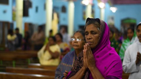 eluru, andhrapradesh / India - 12 09 2018: eluru,andhrapradesh/india 9th december people praying jesus in church priest blessing people