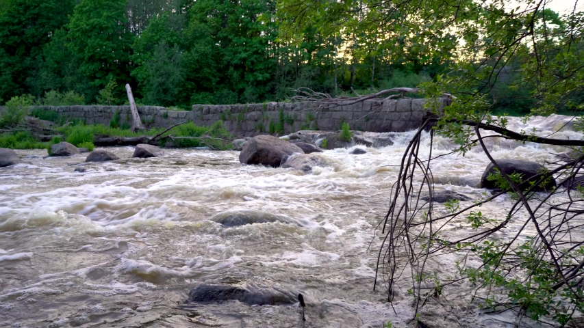 Footage of rapids at Vantaankoski Finland, captured with full frame camera and gimbal, sunset time