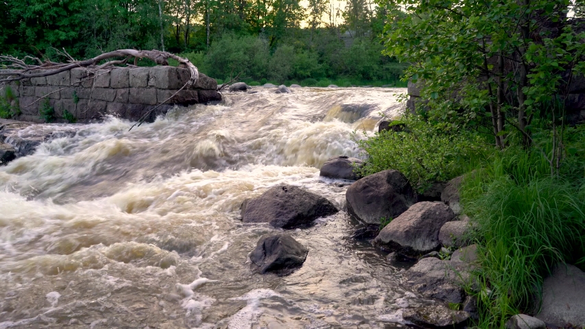Footage of rapids at Vantaankoski Finland, captured with full frame camera and gimbal, sunset time