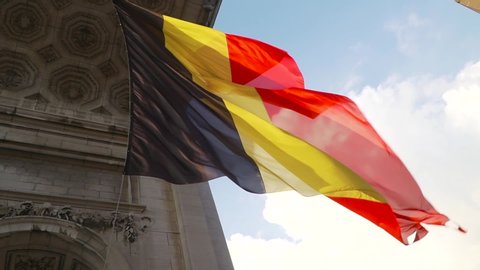 Belgium flag against tricolour stripes waving on wind from Arcade du Cinquantenaire 1920X1080 HD footage (1080p 50fps FullHD video)