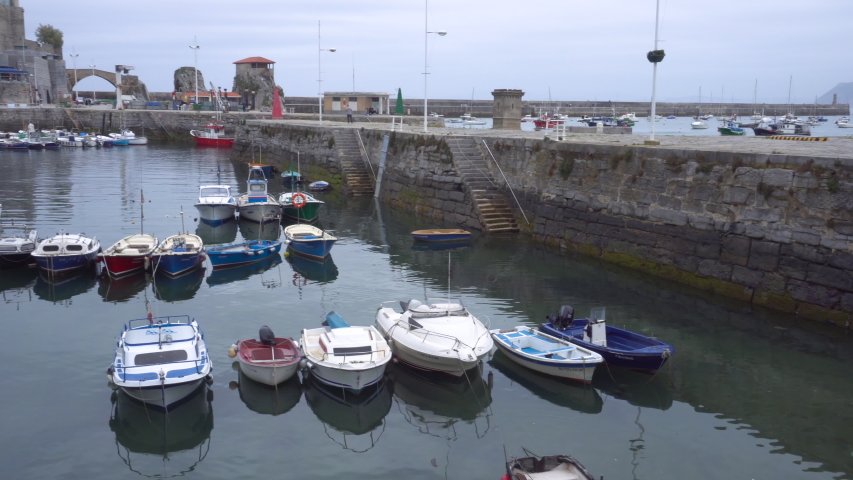 Pan shot of Castro Urdiales port in Cantabria, Spain .