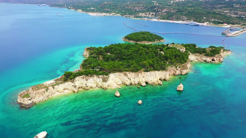 Aerial drone video of famous Venetian fortified islet of Souda featuring small chapel of Agios Nikolaos, Chania, Crete island, Greece
