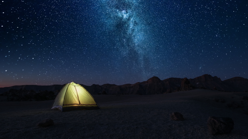 Time-lapse Overnight Stay in a Tourist Tent on a Starry Night High in the Mountains before Dawn Royalty-Free Stock Footage #1031023070