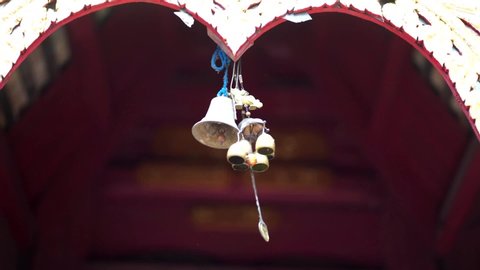 Hanging bells in the temple of Thailand