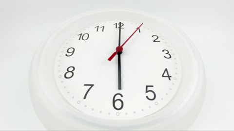 White wall clock  beginning of time 06.00 am or pm, on white background, Time lapse 30 minutes moving fast, Blank for design