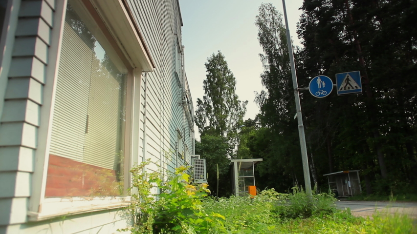 Imatra, Finland. Old house. Cars. Mustalampi district. Summer. Day.