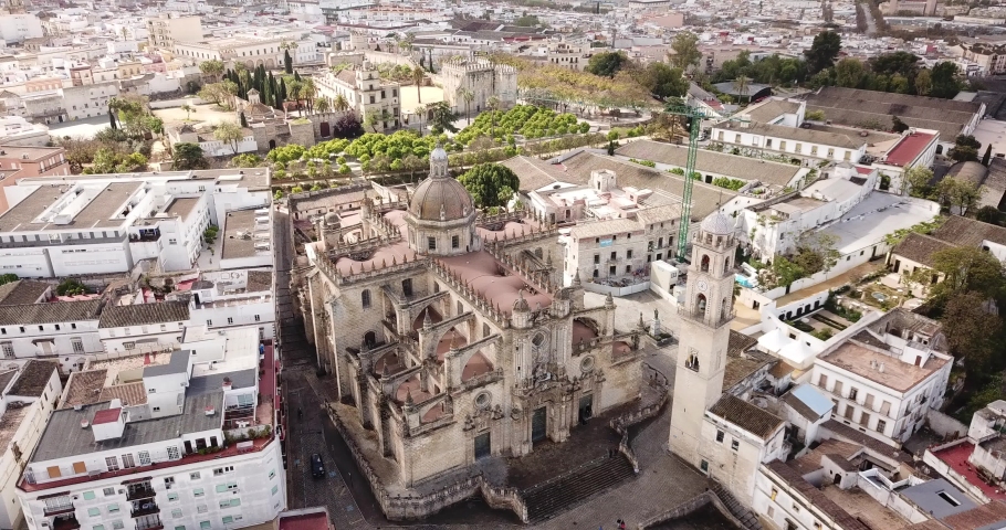 View from drone of residential areas of Spanish town of Jerez de la Frontera with Catholic Cathedral and former Moorish alcazar

