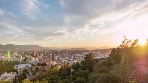 Sunset time lapse of Malaga, Spain - aerial view from Castillo Gibralfaro