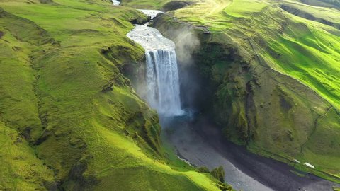  Flying Above Skogafoss Waterfall in Iceland, Water Coming From the Melting Glacier of Eyjafjallajokull Volcano