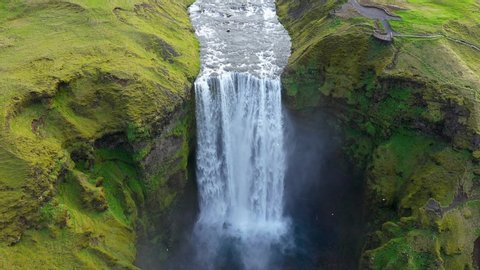 Flying Above Skogafoss Waterfall in Iceland, Water Coming From the Melting Glacier of Eyjafjallajokull Volcano