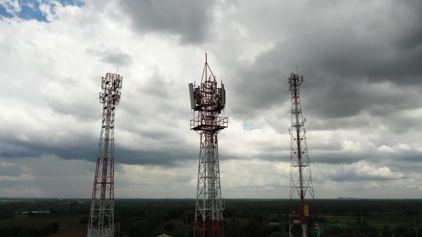 Aerial view of telecom antennas telecommunications towers. Microwave antenna. With camera movement