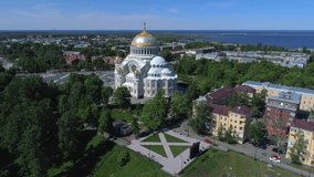 View of old St. Nicholas Naval Cathedral on a Sunny June day (aerial video). Kronstadt, Russia