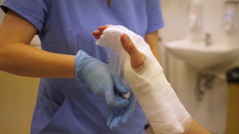 plastering broken arm in the hospital after accident