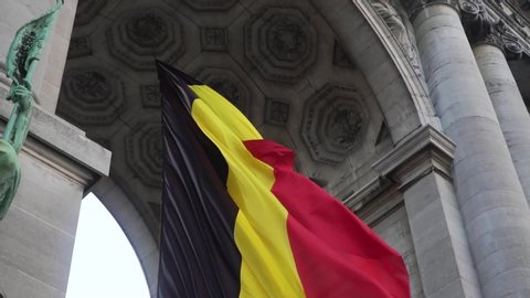 Slow motion of belgium flag against tricolour stripes waving on wind from Arcade du Cinquantenaire 1920X1080 HD footage (1080p 100fps FullHD video)