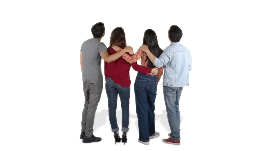 Back view group of young people pointing and looking up in the studio, isolated on white background. Shot in 4k resolution