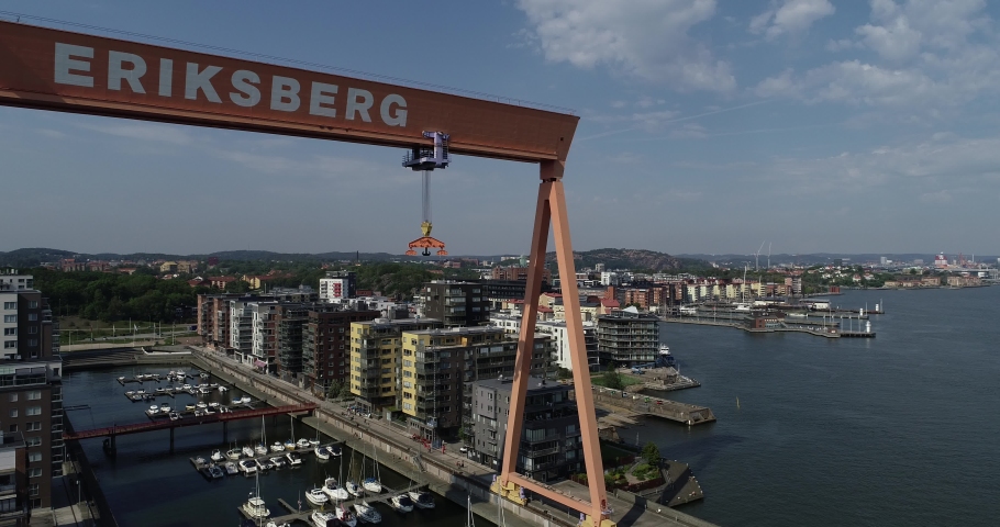 Gothenburg - Sweden. Circa June, 2019: Famous old gantry crane, buildings and river in busy area named "Eriksberg".