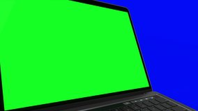 4K Video. Laptop Turning On With green Screen On A blue Background.