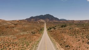 4k aerial drone footage - Beautiful highway to Mt. Holmes.  Henry Mountains, central Utah desert.  