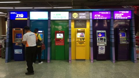 BANGKOK - JUNE 08, 2019: Unidentified people stand by ATMs at the Don Mueang International airport, the worlds largest low cost carrier airport.
