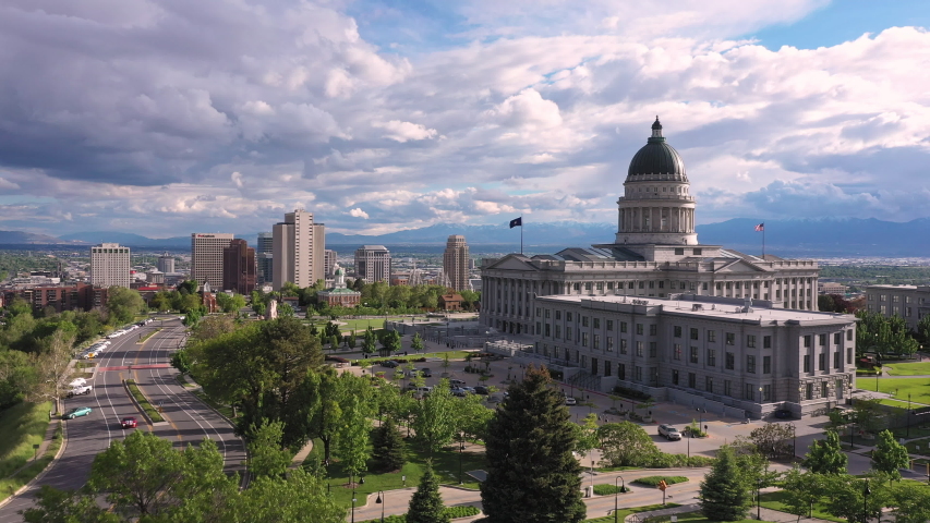 Aerial view flying toward downtown Salt Lake City Utah viewing Temple Square.