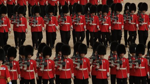 LONDON, circa 2019 - The Grenadier guards march in tight formation during the Trooping the Colour parade to mark the official birthday of Her Majesty Queen Elizabeth II of England