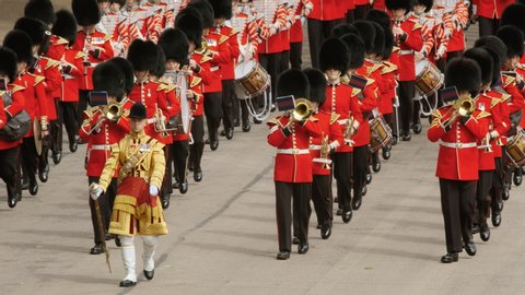 LONDON, circa 2019 - The musicians of the foot guards marching along Horse Guards Parade during the Trooping the Colour event to mark the official birthday of Her Majesty Queen Elizabeth II of England