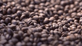 High quality video of falling coffee beans in real 1080p slow motion 120fps.