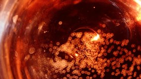 close-up of bubbles rising in red liquid with bokeh effect - Powered by Shutterstock - Get 15% off with code: PIKWIZARD15