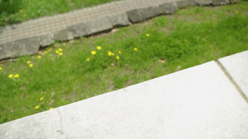 Tilt up overlooking nature are with walking paths, pond, and buildings in Ontario, Canada