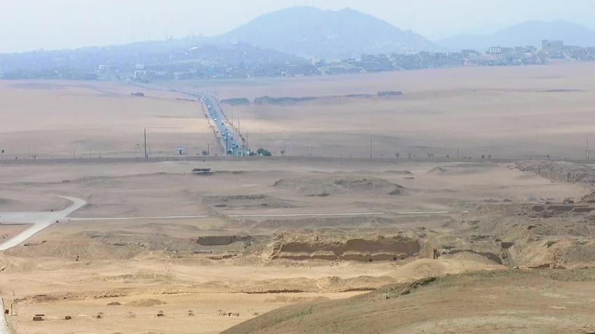 static shot of Pachacamac Archaeological Site, Peru, with the roads and vehicles, touristic historical location