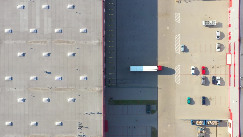 Aerial View of Loading Warehouse with Semi Truck. Aerial