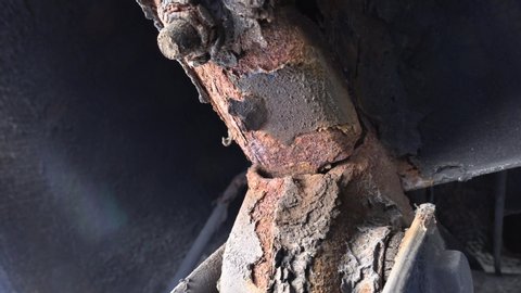 Rust and corrosion from road salt and cracked vehicle frame