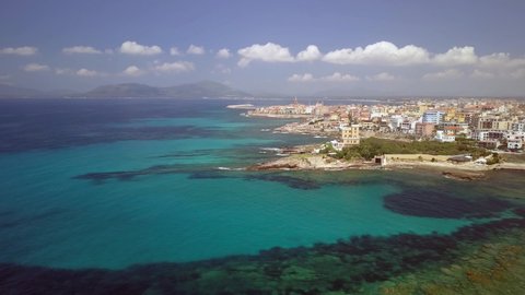 Spectacular aerial view of the city of Alghero from afar