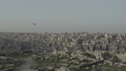 Drone shots for Jabal Al Qalaa in Amman Jordan , a historical place high view .