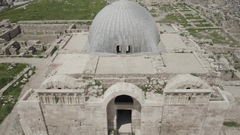 Drone shots for Jabal Al Qalaa in Amman Jordan , a historical place high view .