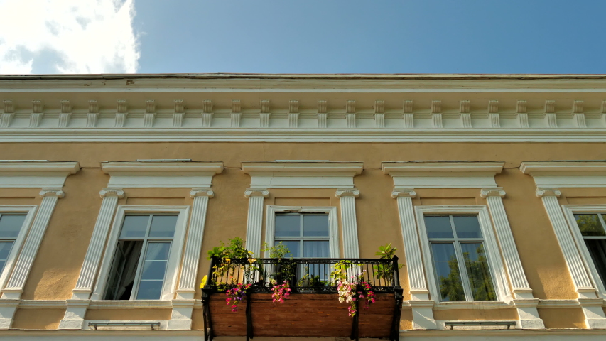 UKRAINE, ODESSA - September 1, 2017: Balcony with flowers against the sky.