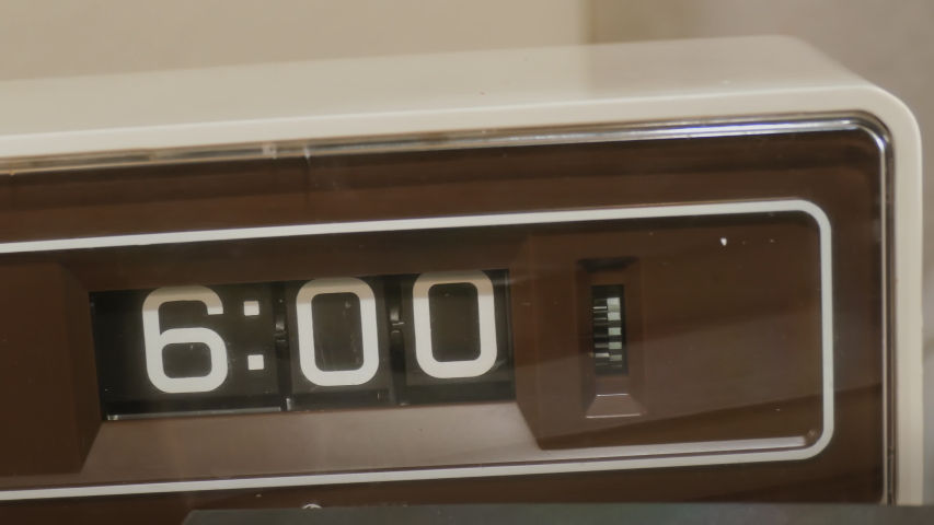 Old retro alarm clock flipping display close up | Shutterstock HD Video #1031400047
