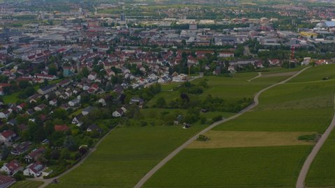 Aerial of the city Heilbronn in Germany, with pan to the right showing the Wartbergturm.