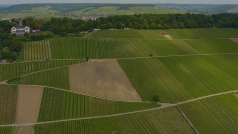 Aerial of vineyards around Heilbronn in Germany, with pan to the right along the hill top of Wartenberg