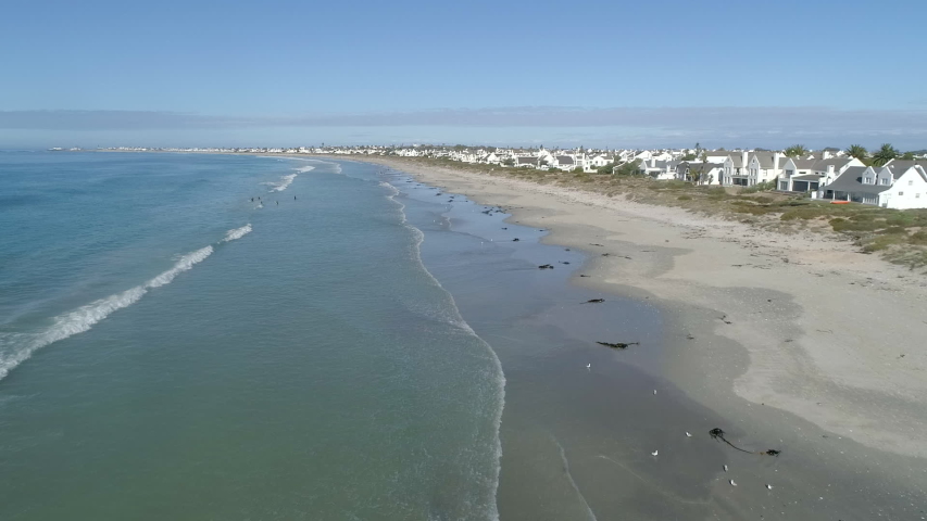 Wide angle aerial view over the ocean at the seaside town of St Helena bay on the West Coast of South Africa