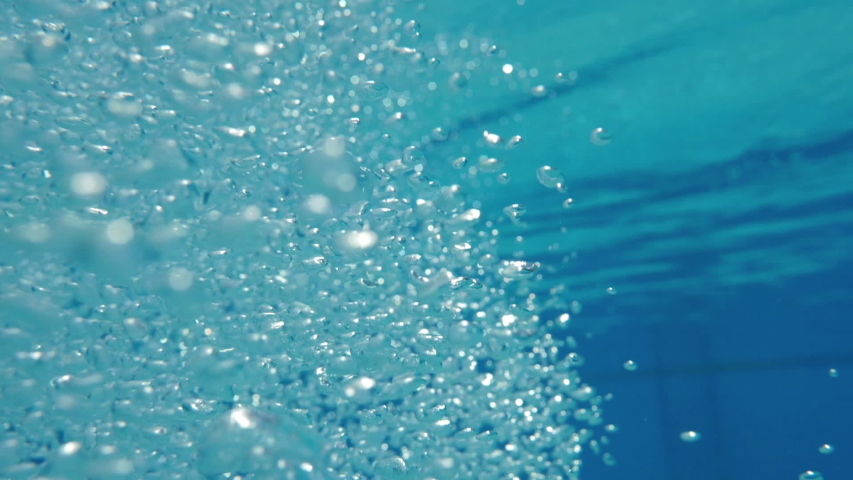 Bubbles rising to the surface. Slow motion. Air bubbles in clear blue water (underwater shot), good for backgrounds | Shutterstock HD Video #1031429537