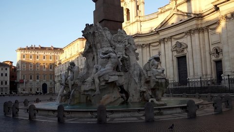 Piazza Navona in early morning - Rome, Italy. Pan footage from Fountain of the Four Rivers to St. Agnes Church in Agone.