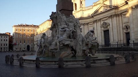 Piazza Navona in early morning - Rome, Italy. Static footage of Fountain of the Four Rivers with St. Agnes Church in Agonein background.