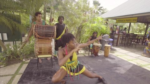 JAMAICA - CIRCA 2018 - Dancers perform for tourism on a stage in Jamaica.