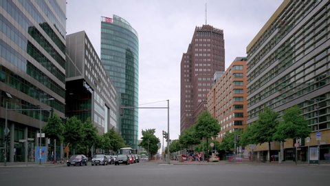 BERLIN, GERMANY - JUNE 16, 2019: Time Lapse: Traffic Near Potsdamer Platz In Berlin, Germany, Skyscrapers In The Background In Summer
