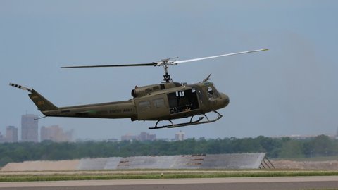 OKLAHOMA CITY, OKLAHOMA / USA - June 2, 2019: A Cold War era UH-1 Huey performs at the Star Spangled Salute Air & Space Show at Tinker Air Force Base.