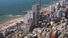 Tel Aviv seascape promenade and hotels skyline aerial drone view 4k  
